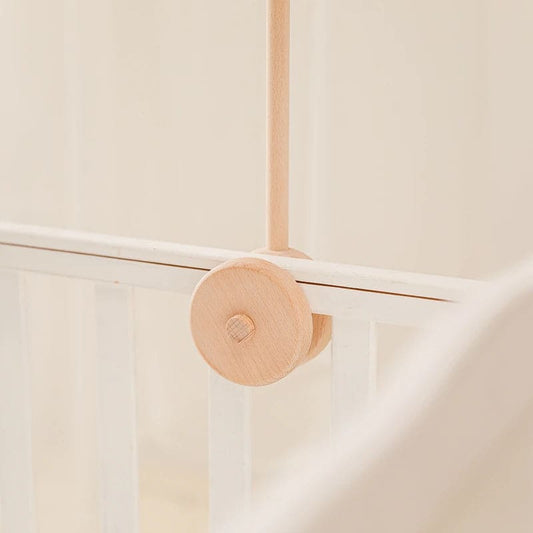 Support en bois pour mobiles d’éveil bébé