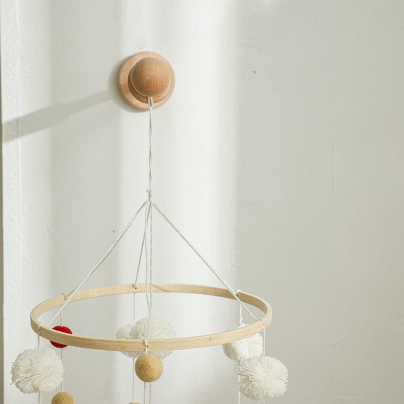 Support mural en bois pour mobiles d’éveil bébé