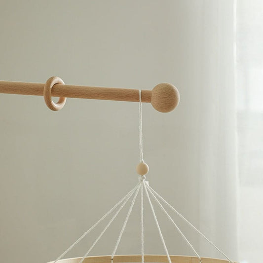 Support mural en bois pour mobiles d’éveil bébé